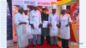 Granduants at Utalii College displaying certificates