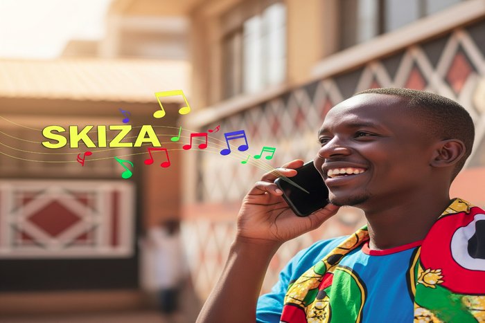 A man enjoying skiza on phone